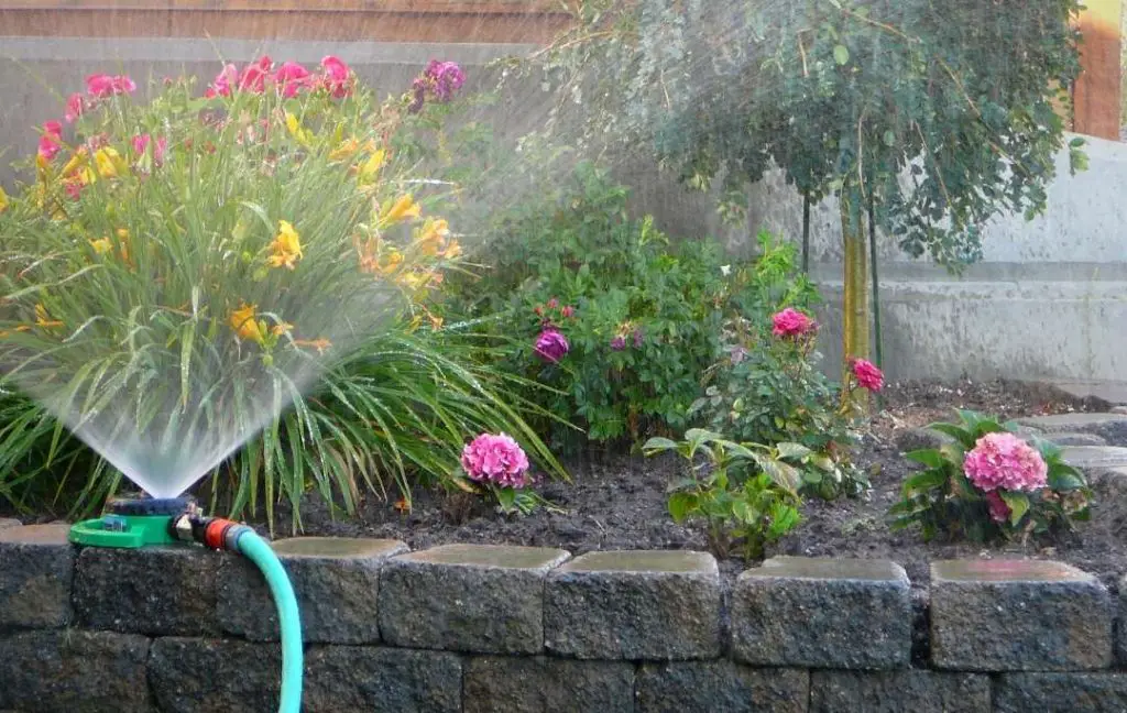 HOW TO EDGE A FLOWER BED WITH STONE?